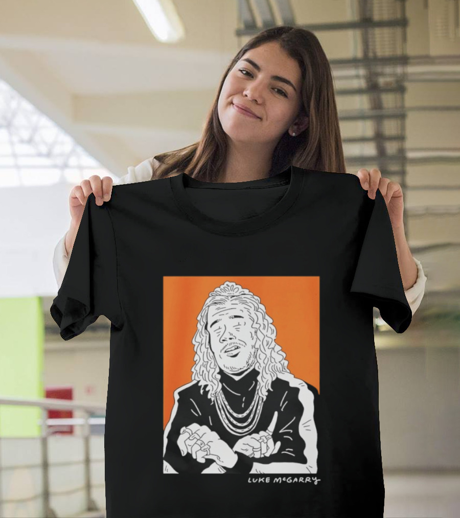 Luke McGarry Cartoon Character With Long Hair And Chains On Orange T-Shirt