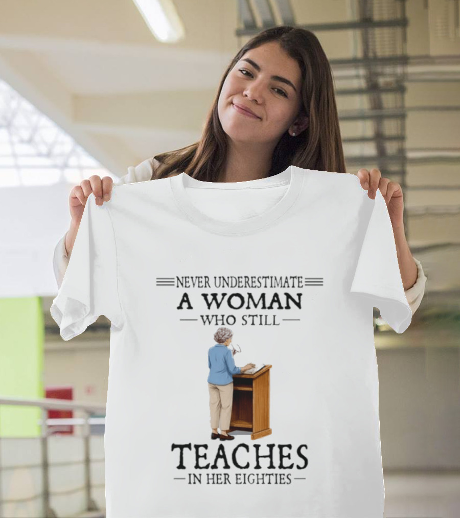 Never Underestimate A Woman Who Still Teaches In Her Eighties 2026 T-Shirt