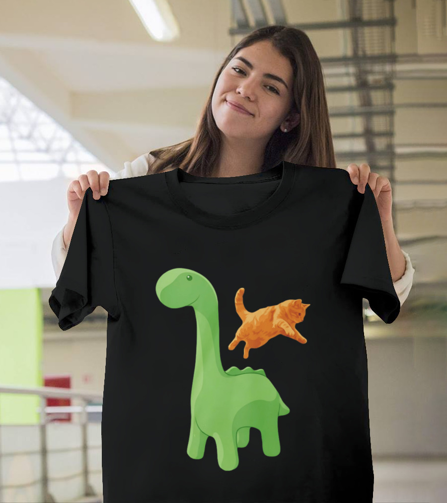 Cat Jumping Over Green Dinosaur Cartoon Image T-Shirt