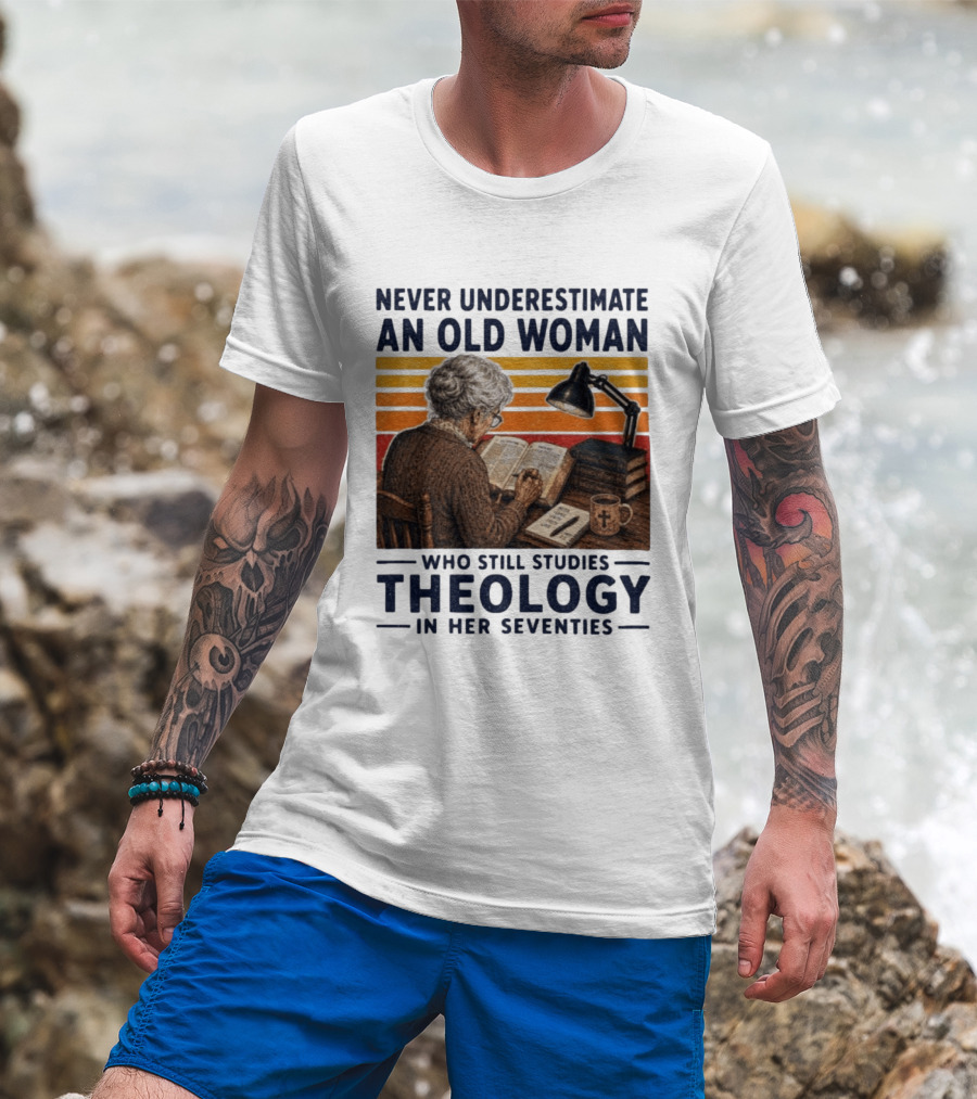 Never Underestimate An Old Woman Who Studies Theology In Her Seventies With Books And Lamp T-Shirt
