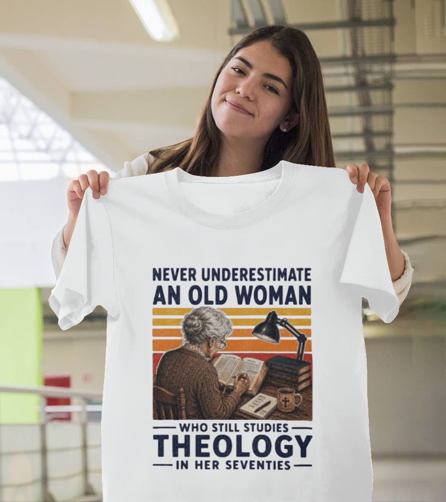 Never Underestimate An Old Woman Who Studies Theology In Her Seventies With Books And Lamp T-Shirt