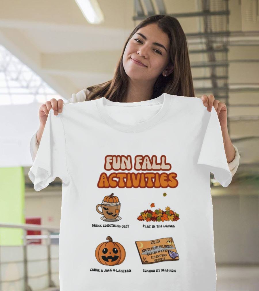 Fun Fall Activities Halloween Drink Something Cozy Ouija Board Carve A Jack O Lantern Play In The Leaves T-Shirt