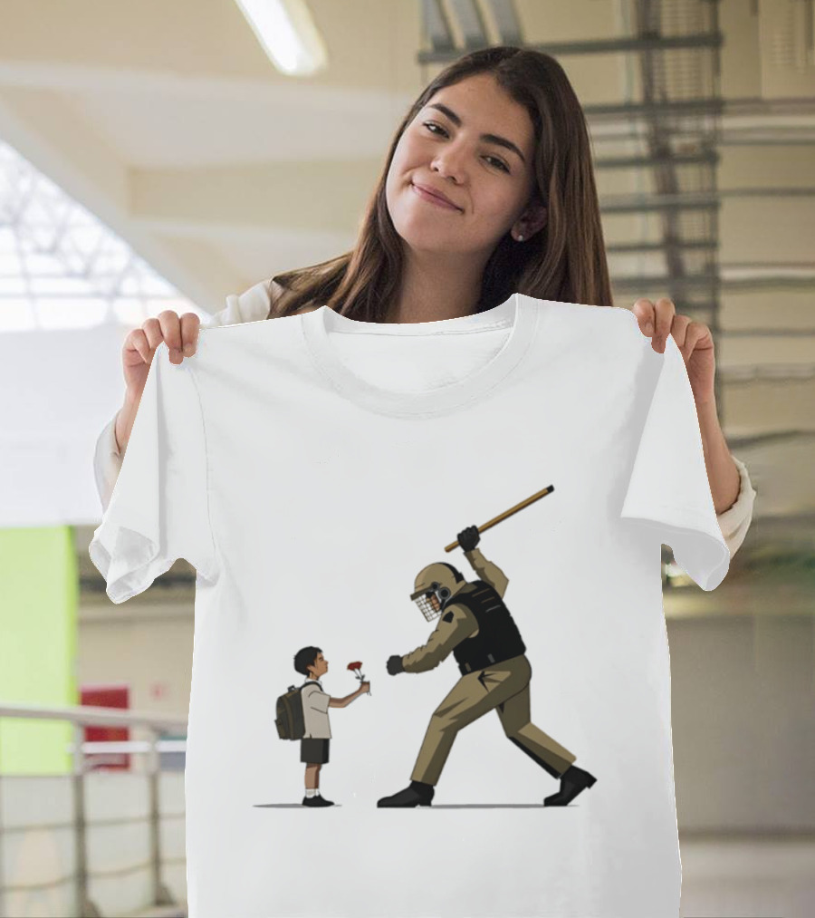 Bloom Under Fire: Child Offering Flower To Armed Officer T-Shirt
