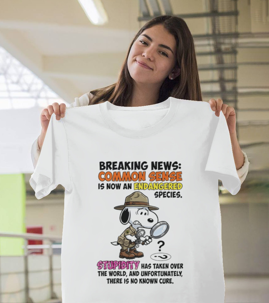 Breaking News Common Sense Endangered Species Stupidity Taken Over Snoopy T-Shirt
