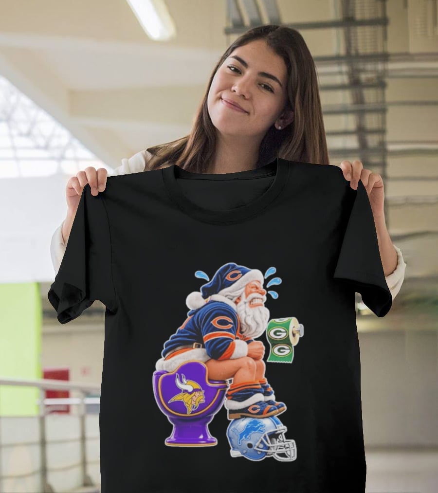 Santa Claus On Toilet Minnesota Vikings Detroit Lions Green Bay Packers Chicago Bears Funny Christmas 2026 Football T-Shirt