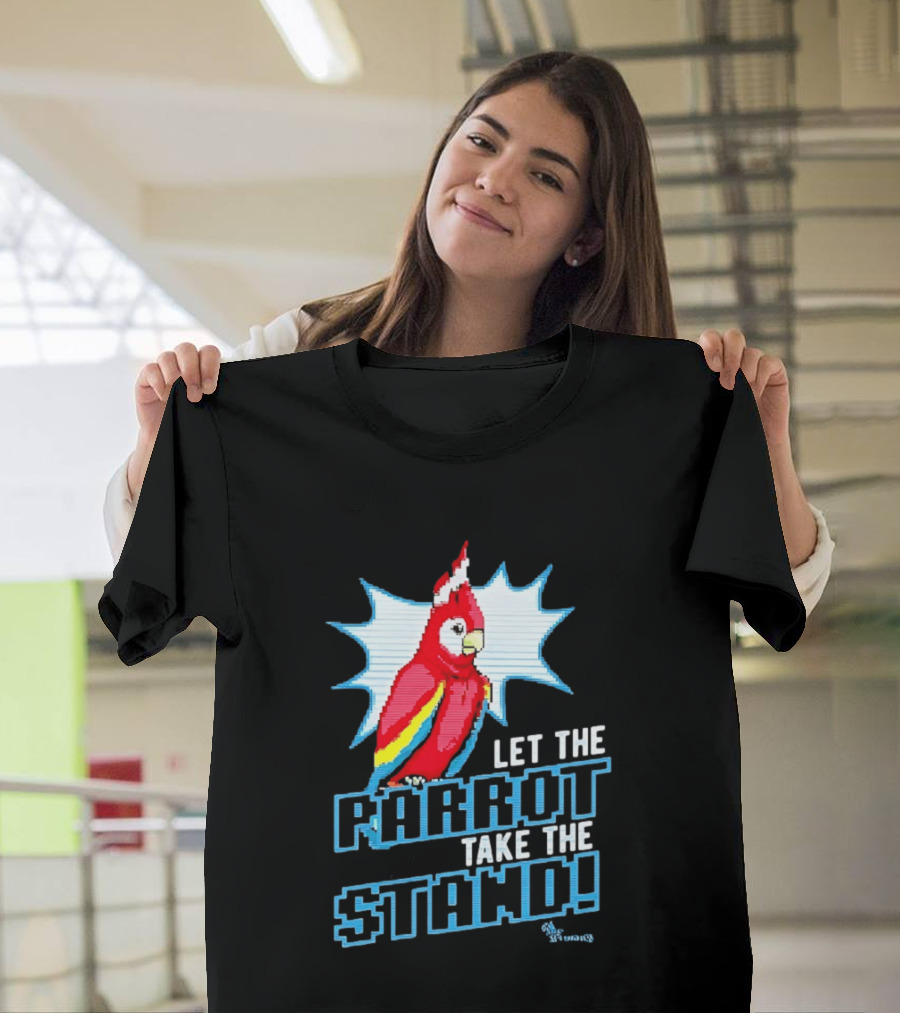Let The Parrot Take The Stand Vibrant Red Bird With Santa Hat And Blue Starburst T-Shirt