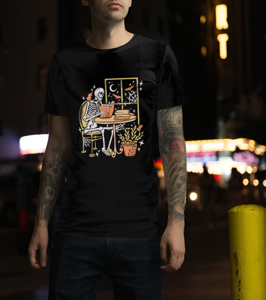 Cartoon Skeleton Reading Under Crescent Moon With Bats Orange Book Table Window T-Shirt