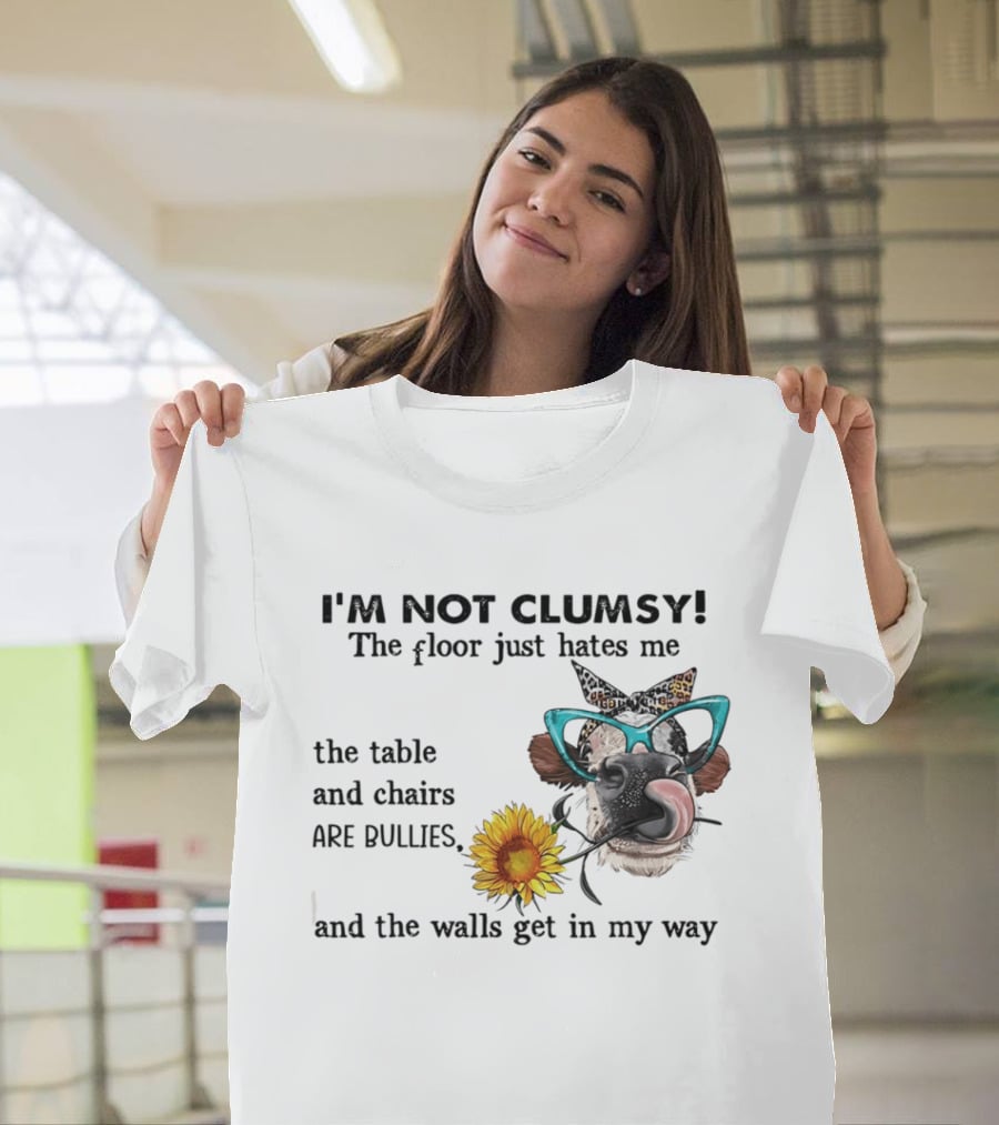 I'm Not Clumsy The Floor Hates Me The Table Chairs Bullies Walls Get In My Way Cow Sunflower Butterfly Glasses Tongue Out T-Shirt