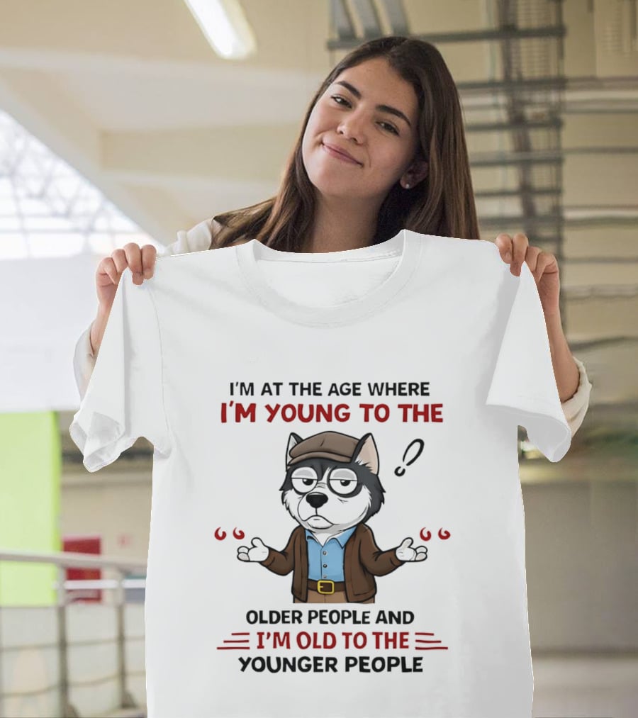 I'm At The Age Where I'm Young To The Older People And I'm Old To The Younger People Cartoon Husky Shrugging T-Shirt