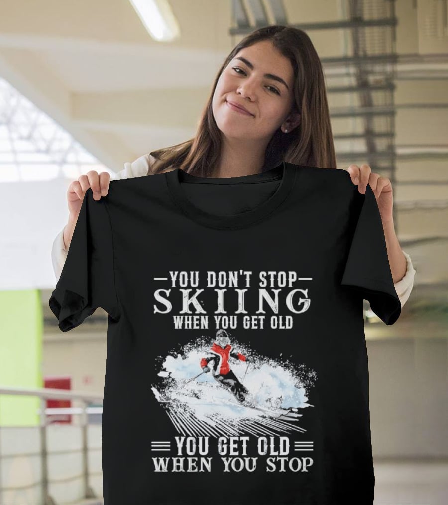 You Don't Stop Skiing When You Get Old You Get Old When You Stop Older Woman Skier Spraying Snow T-Shirt