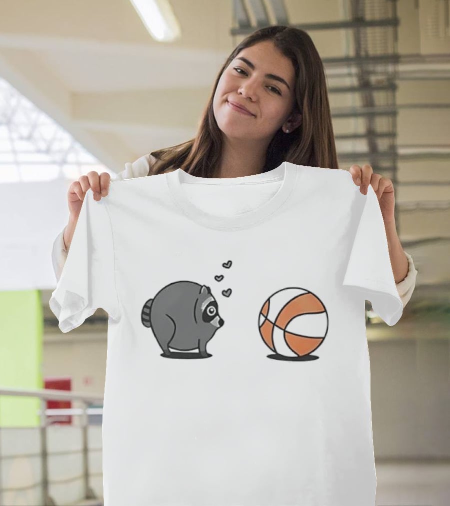 Chubby Cartoon Raccoon Admiring Basketball With Pink Hearts T-Shirt
