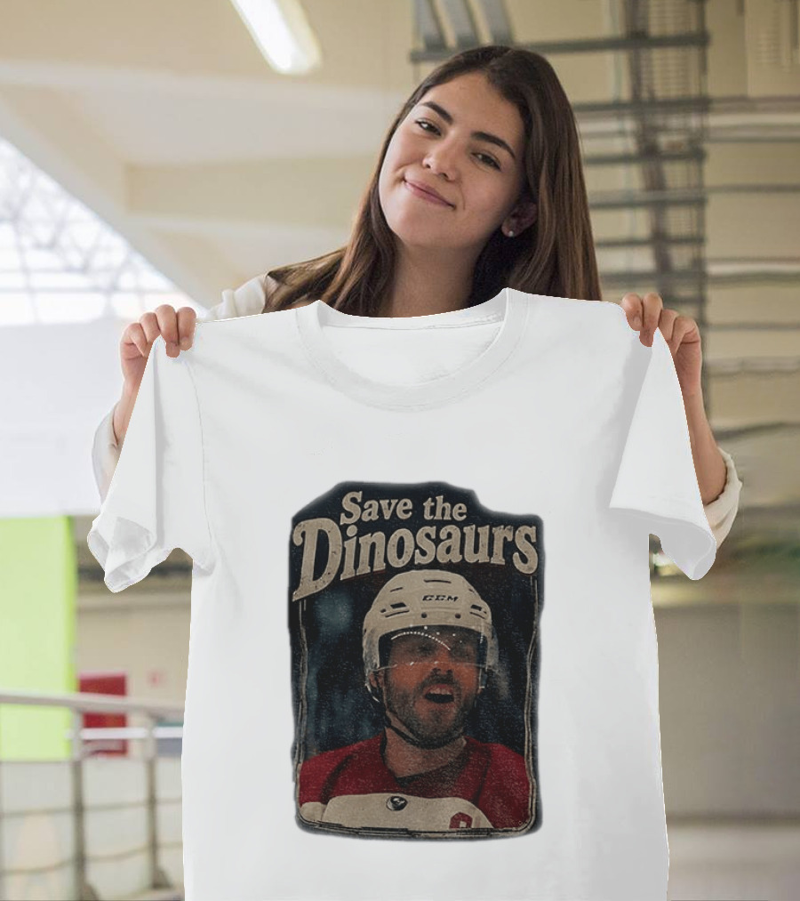 Connor Storrie Wearing Scott Hunter Save The Dinosaurs CCM Hockey T-Shirt