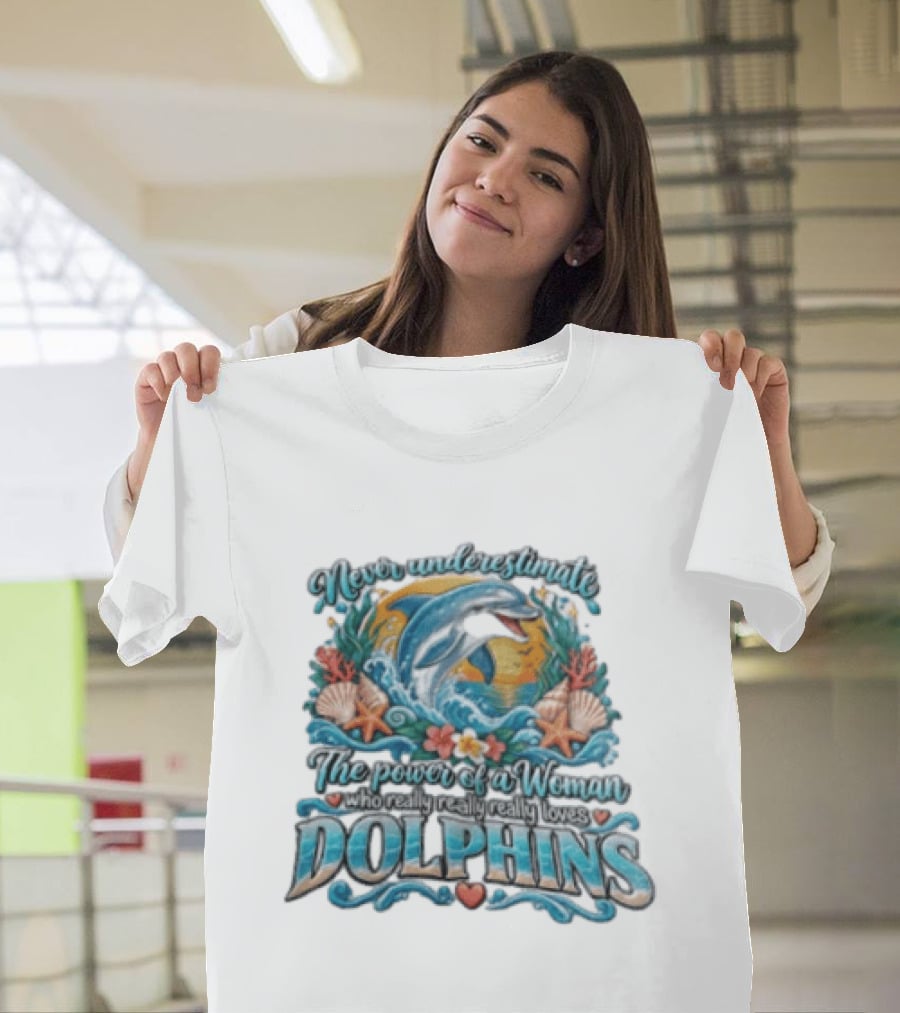 Never Underestimate The Power Of A Woman Who Really Loves Dolphins Ocean Waves Sunburst Shells T-Shirt