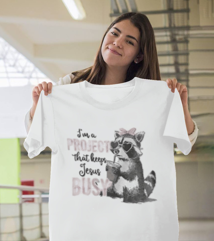 I'm A Project That Keeps Jesus Busy Raccoon Wearing Bow T-Shirt