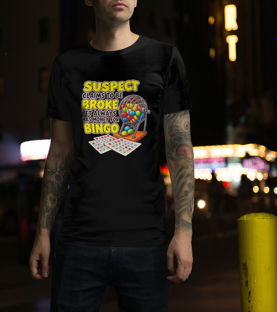 Suspect Claims To Be Broke Yet Always Has Money For Bingo With Colorful Bingo Cage And Cards T-Shirt