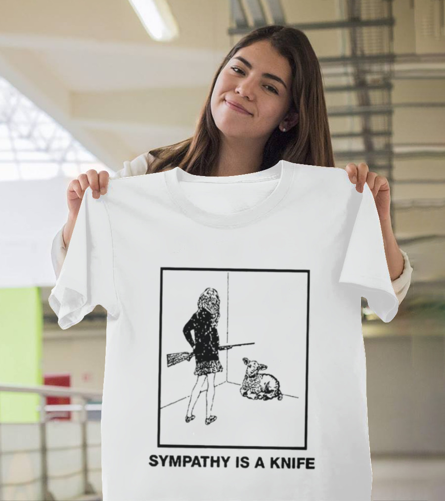 Sympathy Is A Knife Dark Silhouette Holding Object Next To Seated Figure T-Shirt