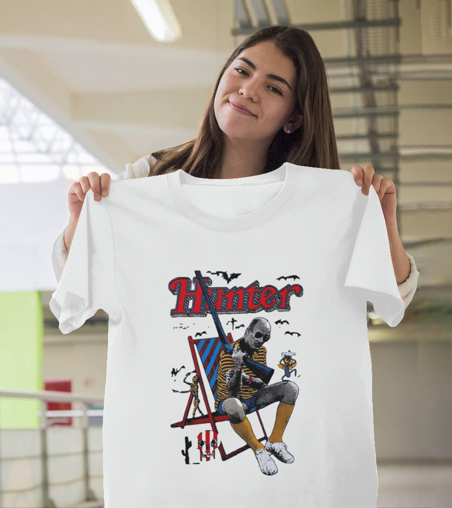 Hunter July 18 1937 February 20 2005 Man Holding Rifle Striped Chair Yellow Socks T-Shirt