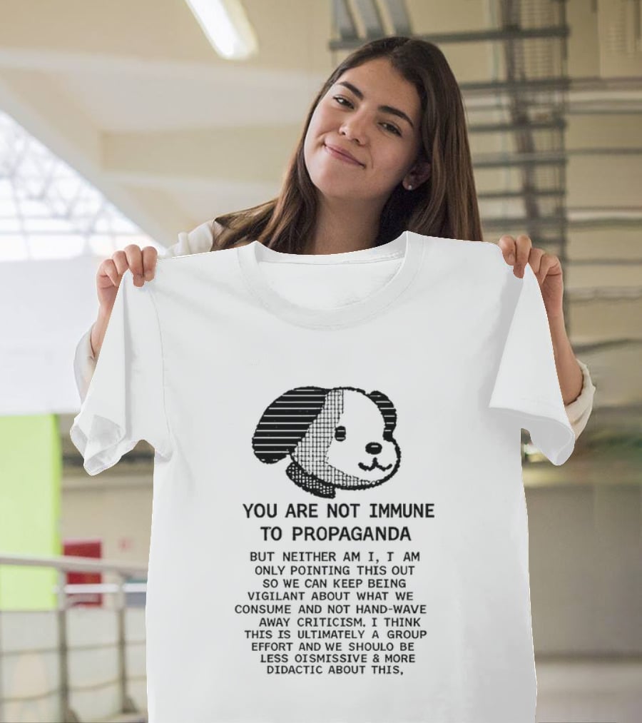Snoopy You Are Not Immune To Propaganda Stay Vigilant T-Shirt