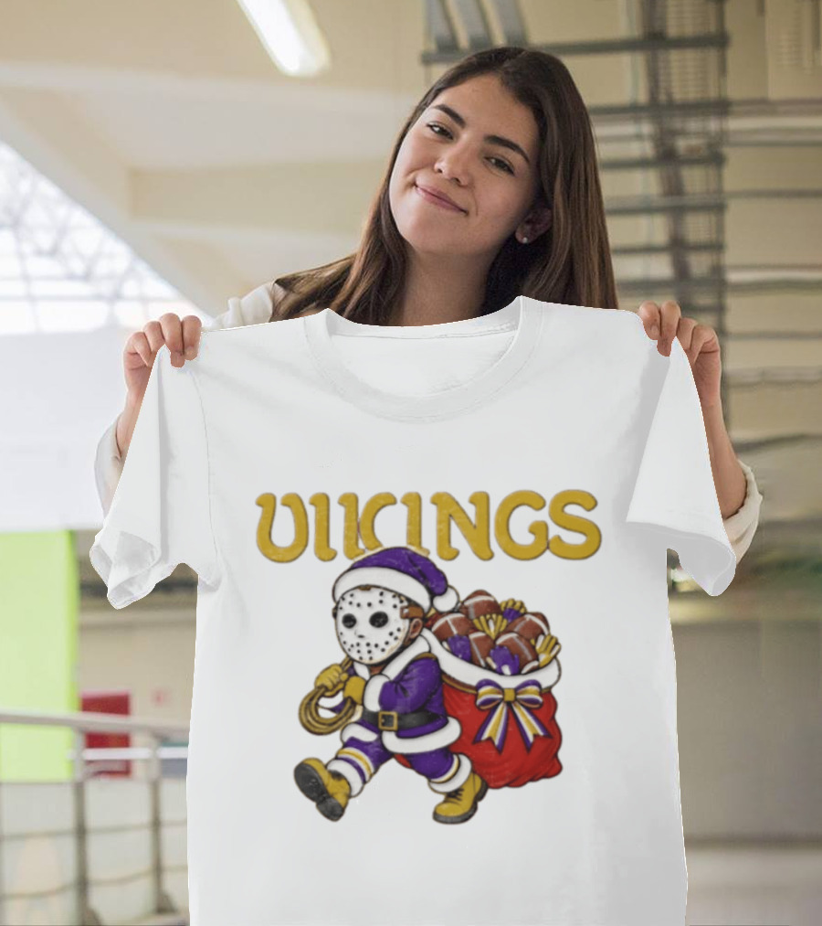 Minnesota Vikings Football Christmas Purple And Gold Santa Carrying Footballs T-Shirt