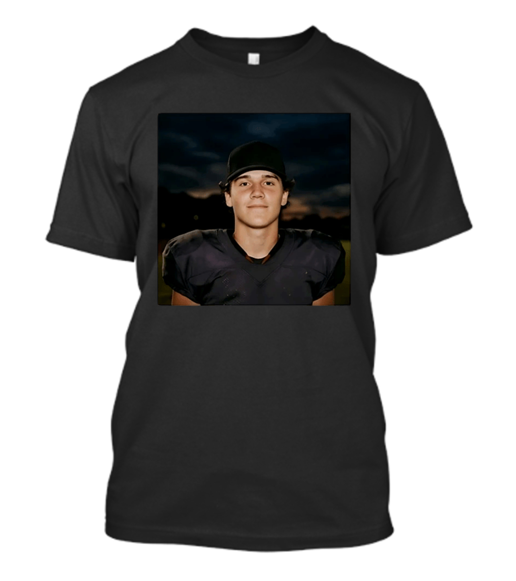 Young Football Athlete Wearing Black Cap And Shoulder Pads T-Shirt