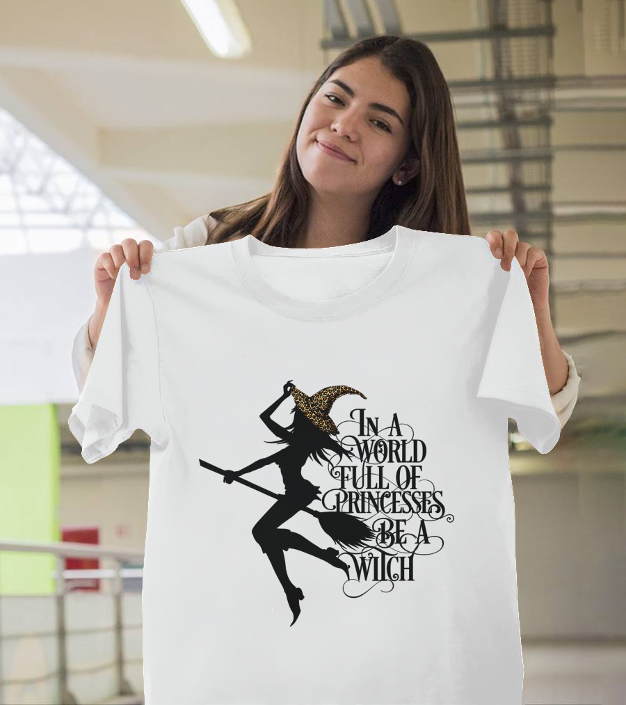 In A World Full Of Princesses Be A Witch Silhouette With Broom And Leopard Print Hat T-Shirt