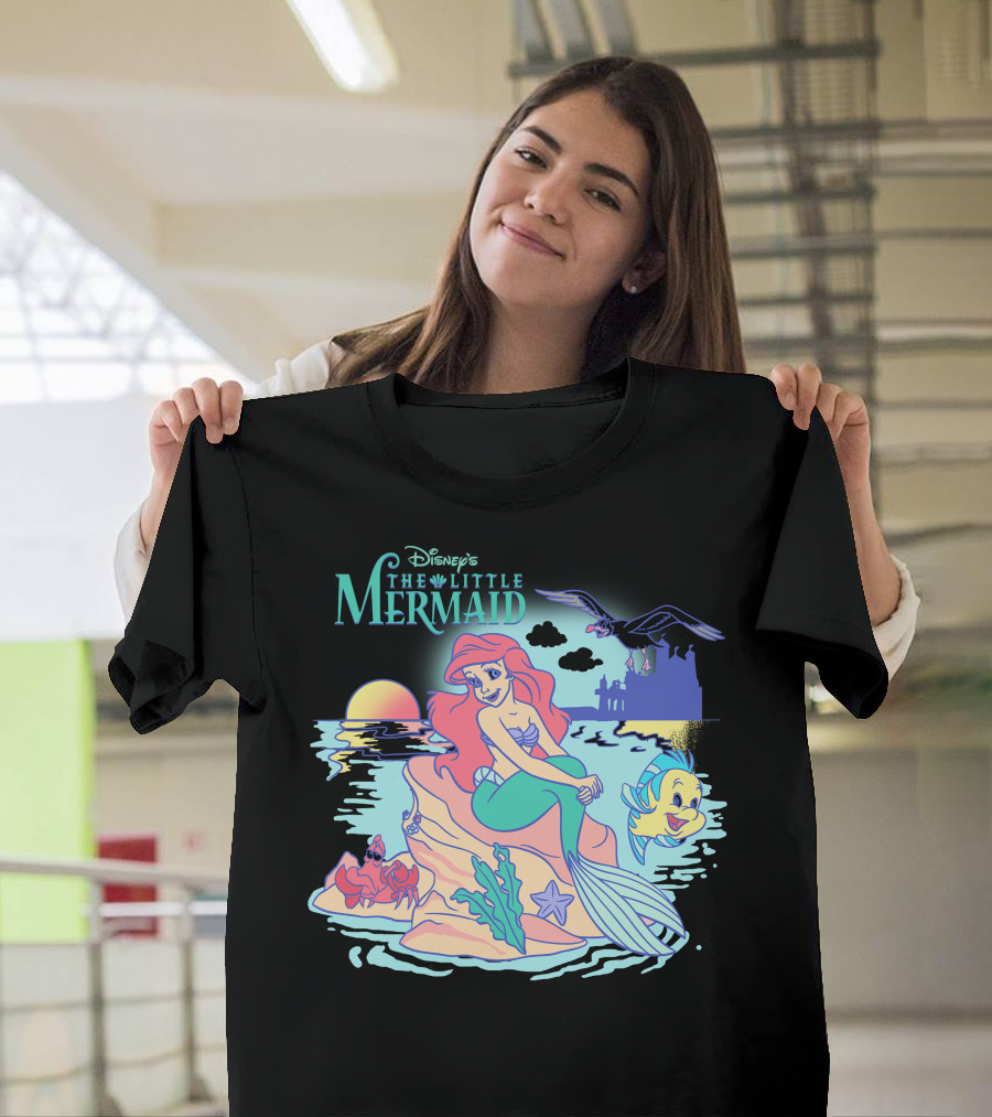 Disney's The Little Mermaid Ariel With Flounder And Sebastian By Castle At Sunset T-Shirt