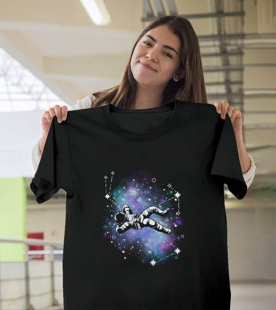 Floating Astronaut Amidst Cosmic Constellations T-Shirt