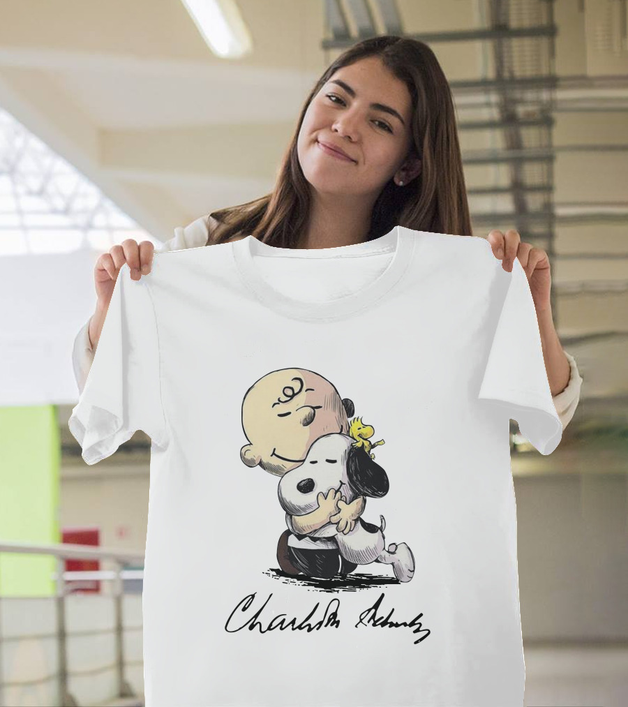 Peanuts Charlie Brown Snoopy Woodstock Hug By Charles Schulz T-Shirt