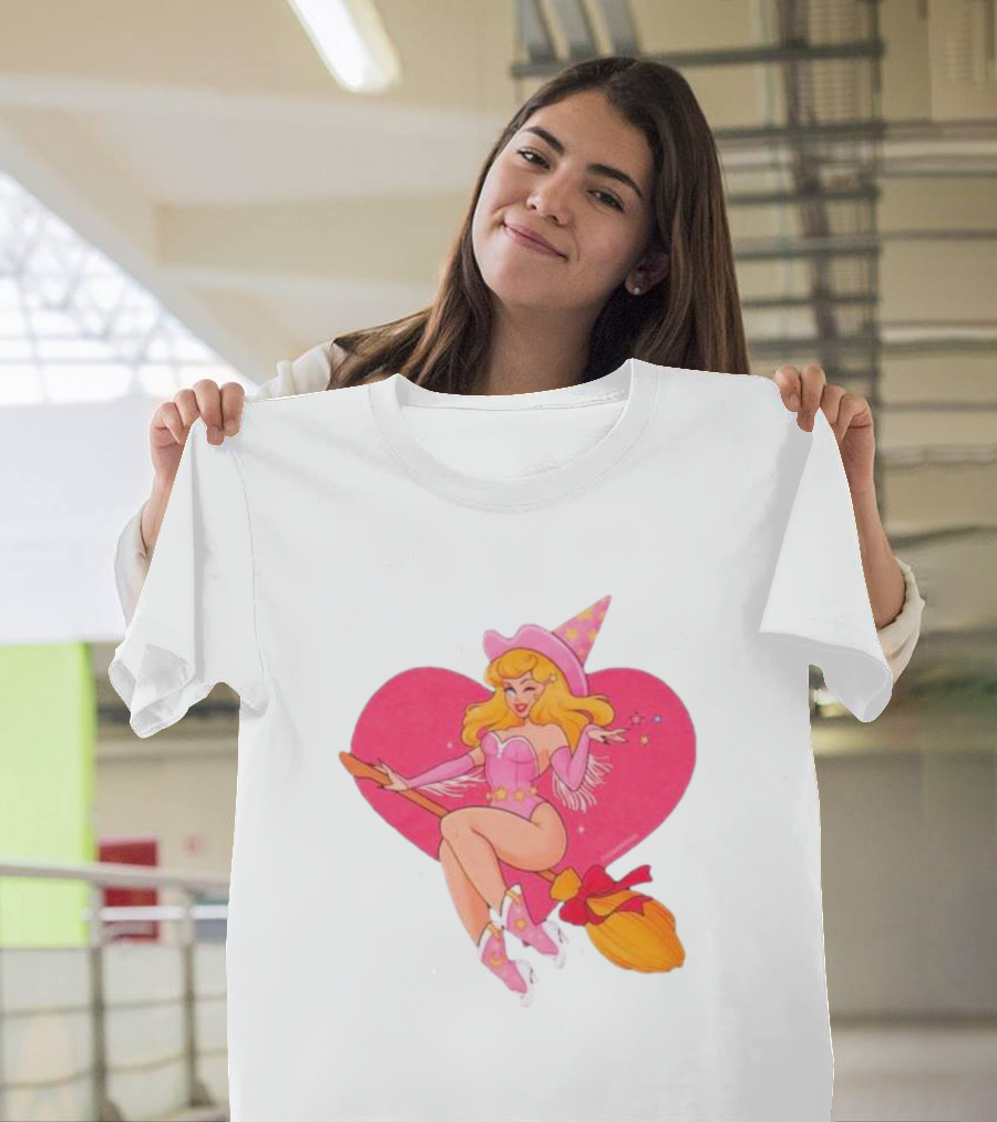 This Barbie Is A Witch Riding A Broomstick With Pink Heart Background T-Shirt