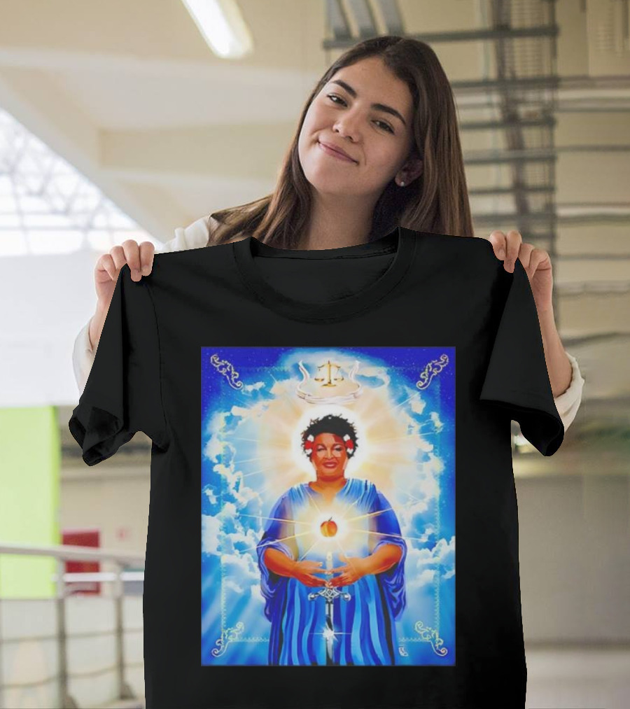 Stacey Abrams Patron Saint of Fairness in Voting with Scales of Justice Halo and Glowing Apple in Celestial Clouds T-Shirt