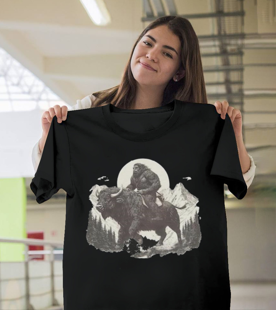 Blurry Creatures Bigfoot Riding Buffalo With Mountains And Moon In Background T-Shirt