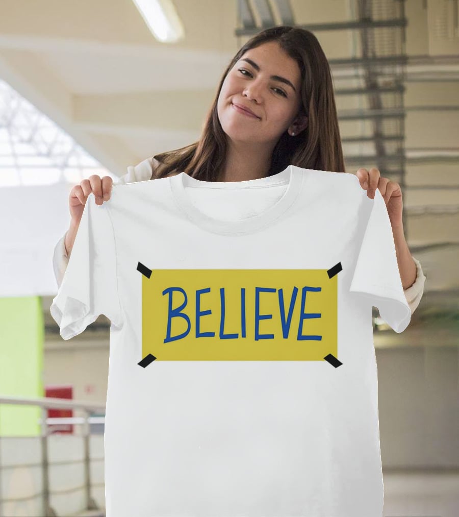 Ted Lasso Believe Sign Taped Yellow Background T-Shirt