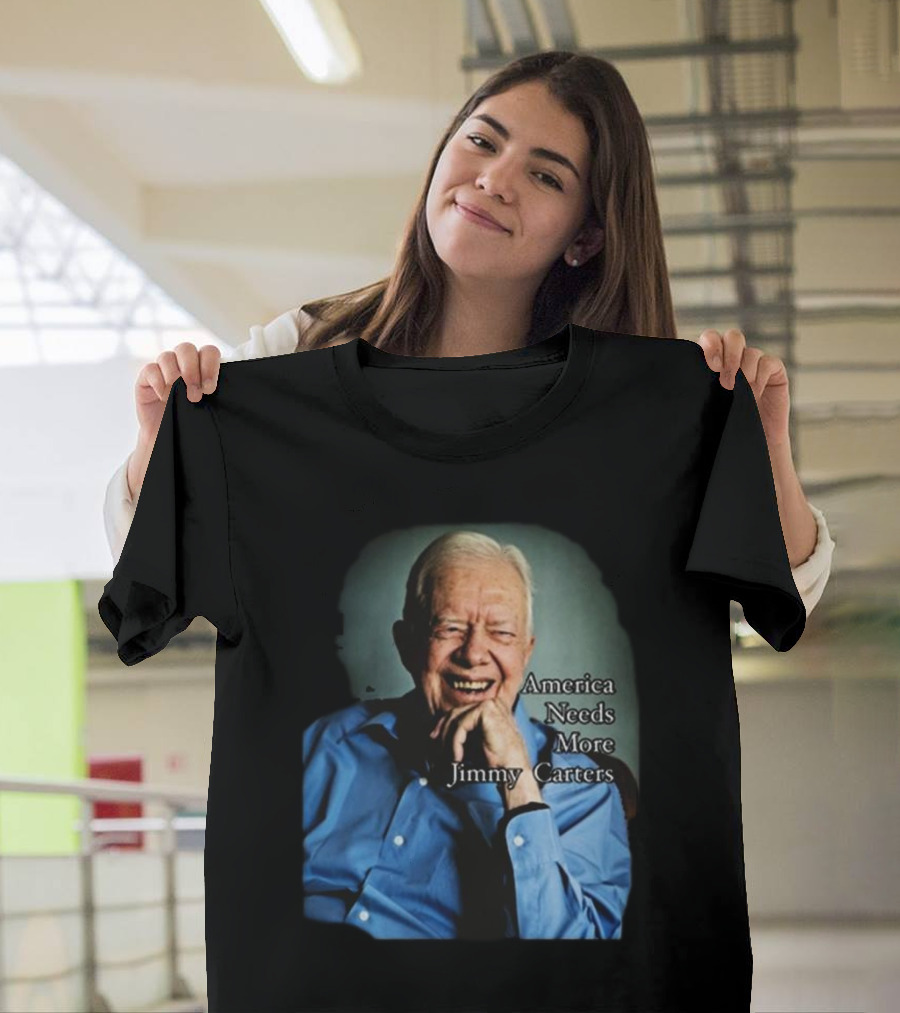 Norbert Leo Butz America Needs More Jimmy Carters Image with Smiling Elderly Man in Blue T-Shirt