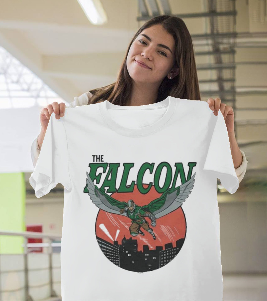 The Falcon Soaring Over City Skyline In Action-Packed Comic T-Shirt