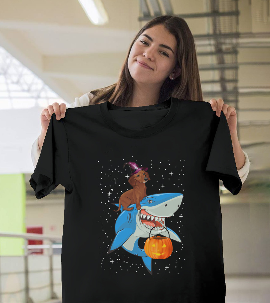 Dachshund Witch on Shark Carrying Jack-o'-Lantern in Starry Halloween Sky T-Shirt