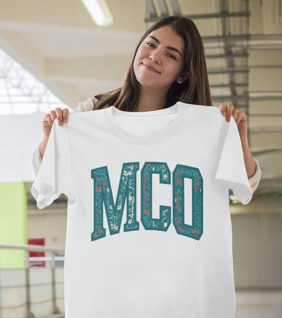 MCO Magic Carpet Oasis Vintage Teal Textured Letters T-Shirt