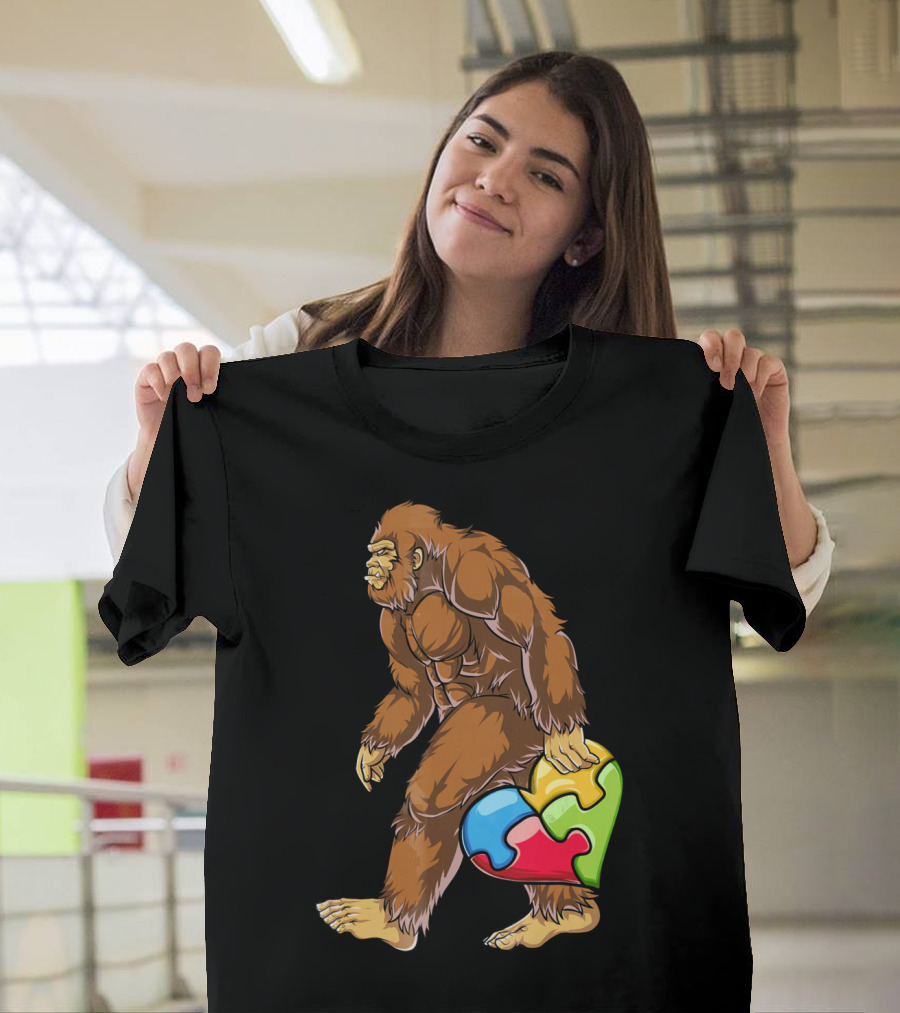 Bigfoot Holding Puzzle Piece Heart Autism Awareness T-Shirt