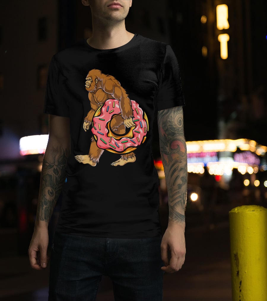 Bigfoot Sasquatch Holding Sprinkled Donut T-Shirt