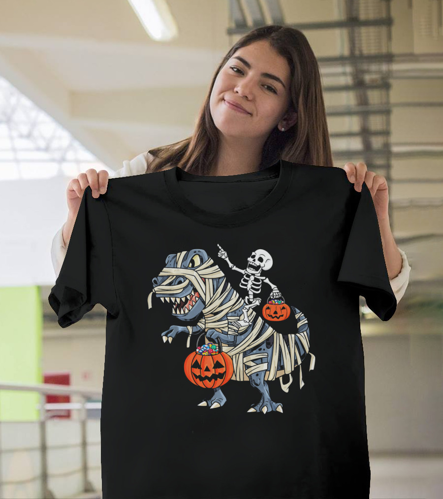 Skeleton Riding Mummy T-Rex With Pumpkin Candy Buckets Halloween Bo T-Shirt