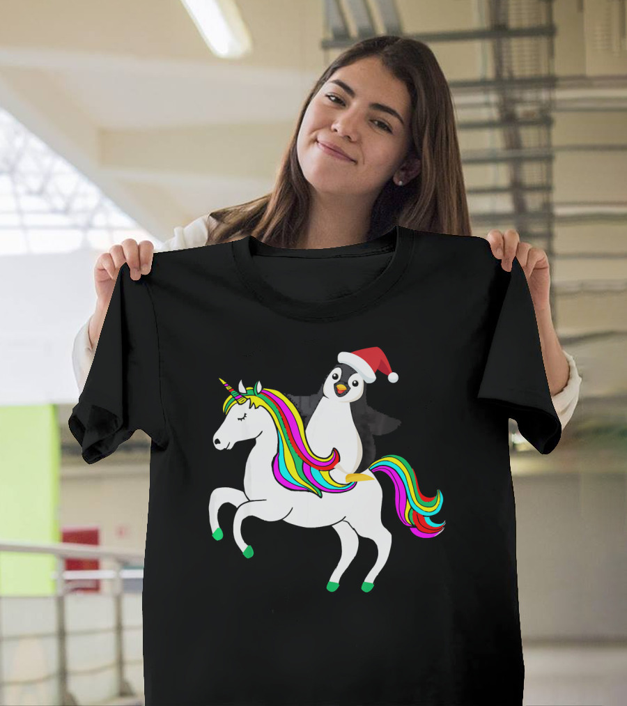 Penguin in Santa Hat Riding a Rainbow Unicorn T-Shirt